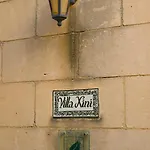 Xini *